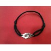 Bracelet Dinh Van Menottes R12 sur cordon noir