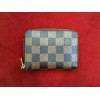 Porte-monnaie Louis Vuitton Zippy en toile damier