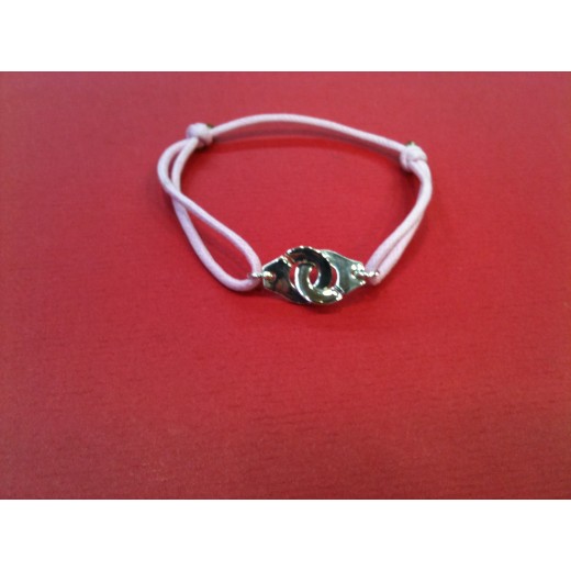 Bracelet Dinh Van Menottes R12 en argent sur cordon