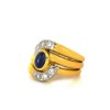 Bague en or jaune godrons avec diamants et cabochon saphir